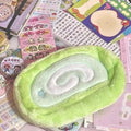 Honeydew colour velvet pencil case with swiss roll cake design for stationery storage