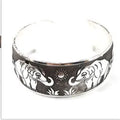 Ethnic carved open Miao silver style bracelet in alloy with Roman shape, elephant colour option