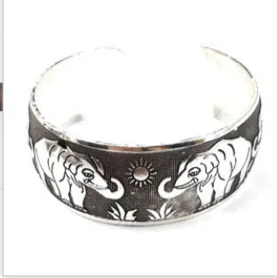 Ethnic carved open Miao silver style bracelet in alloy with Roman shape, elephant colour option