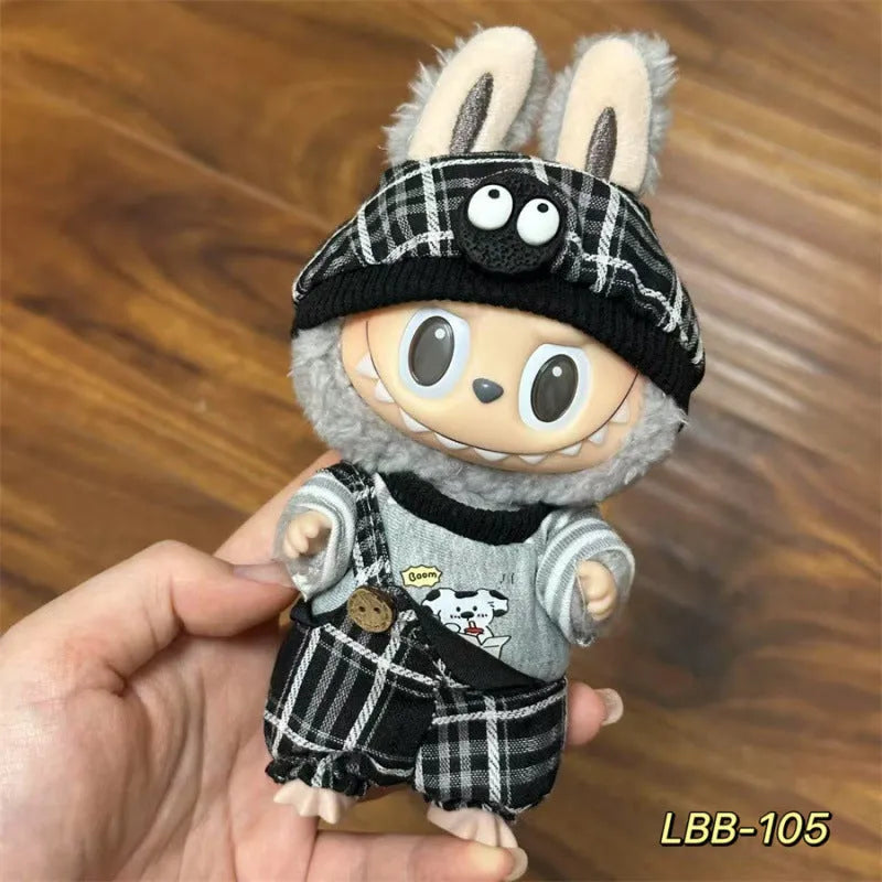 Plastic doll costume for a 17cm tall vinyl figurine on a white background.