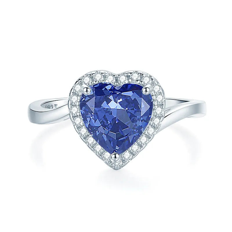 Heart-shaped high carbon zircon stone set in a sterling silver women's ring, shown in a Tan Sang colour.