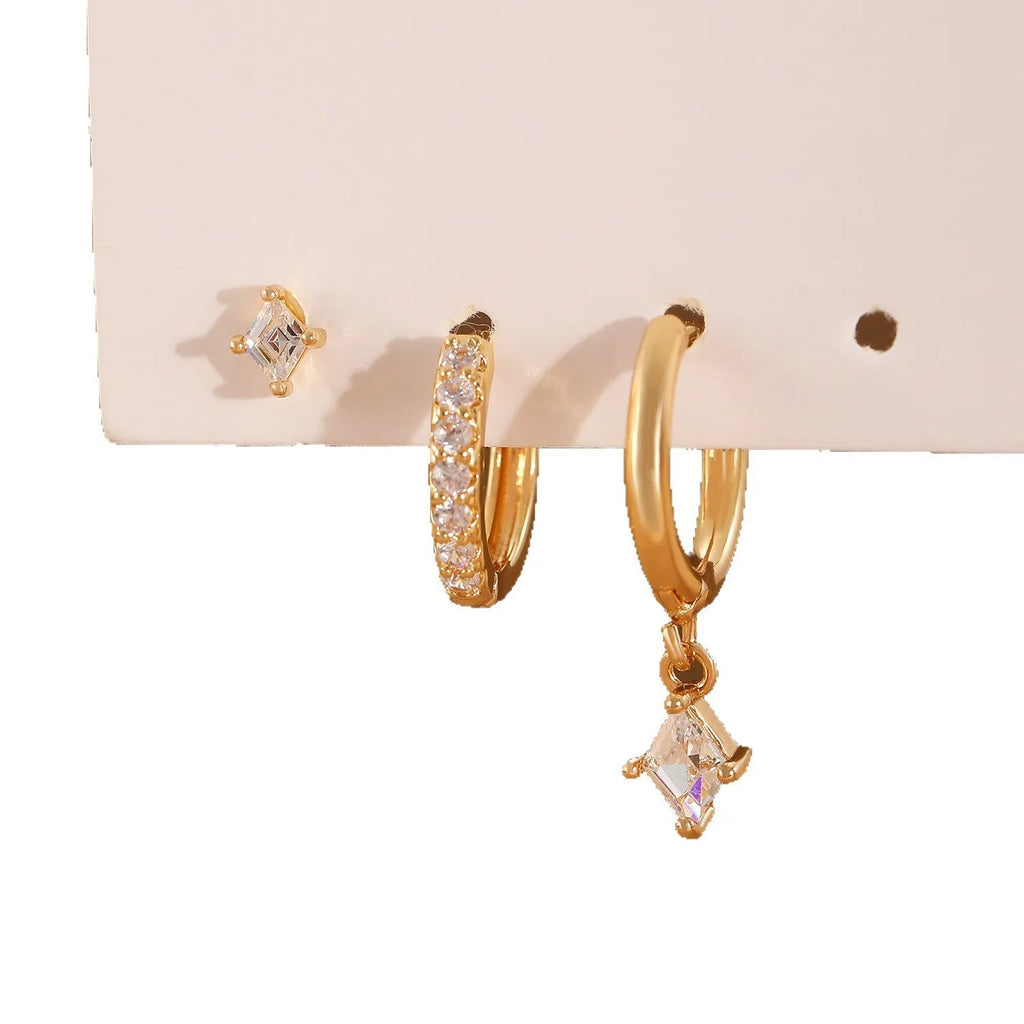 Ladies three-piece jewellery set with geometric designs and inlaid zircon stones in gold and silver colours