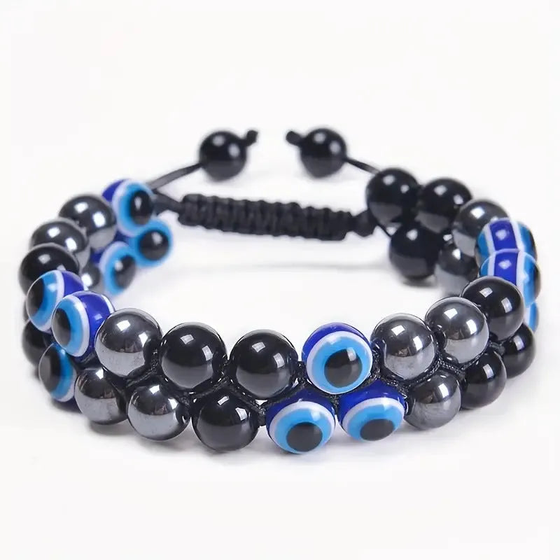 Chinese-style artistic retro lapis lazuli bracelet with green and gold stone on a white background.