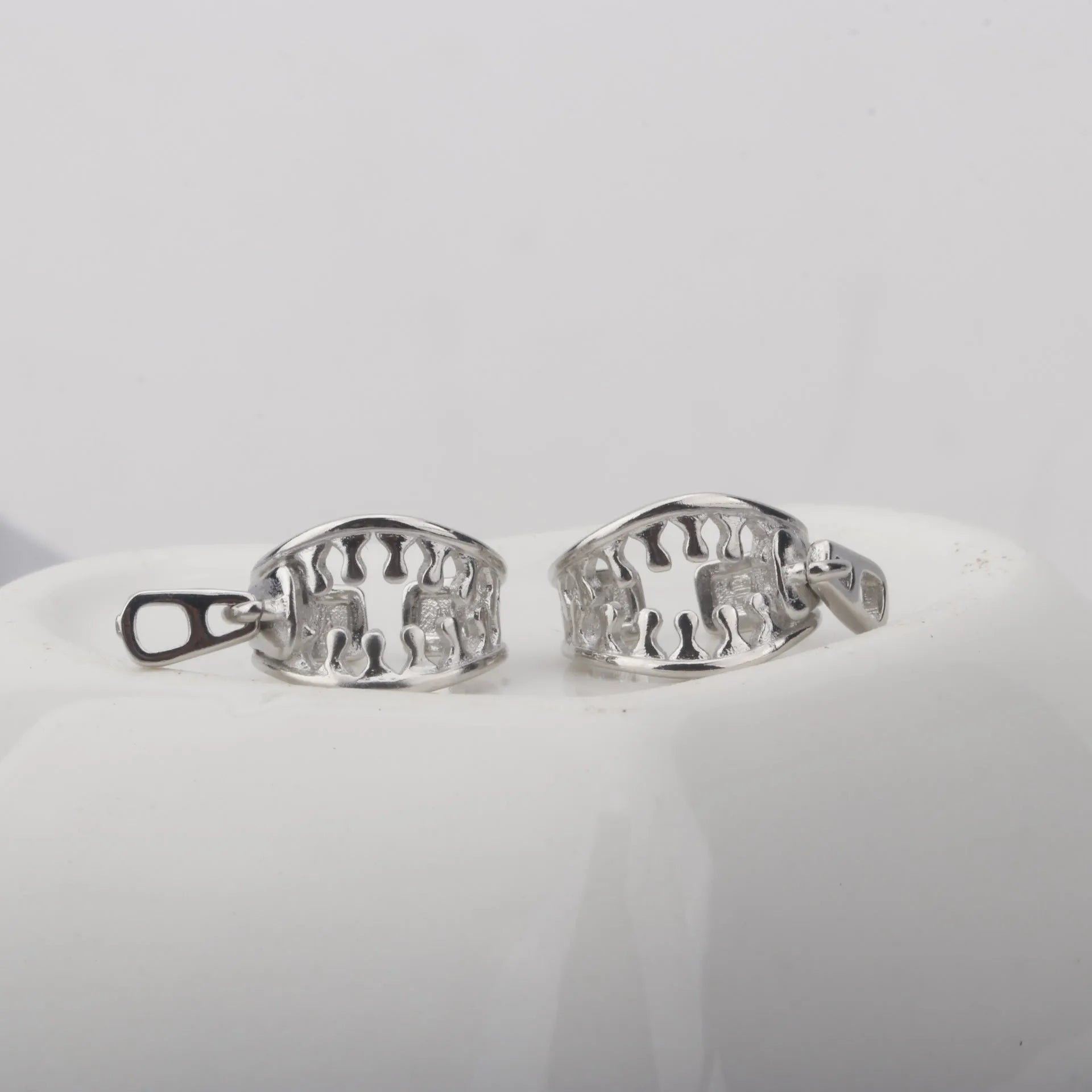 Pair of copper geometric clip-on earrings with minimalist line design in colour ES862.