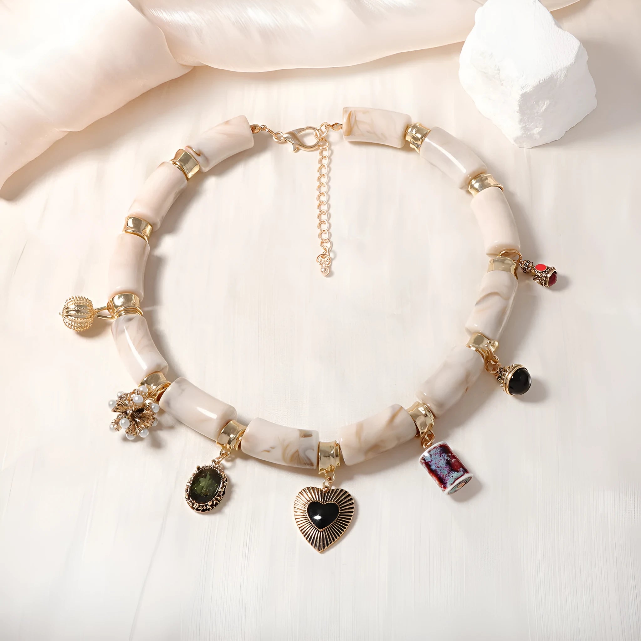 Resin bamboo necklace with heart-shaped pendant and electroplated finish