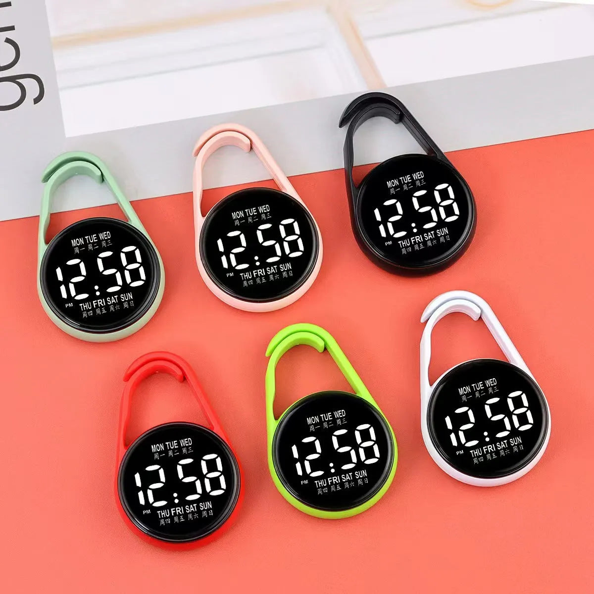 Simple luminous LED digital watch with a plastic strap, shown in one of ten available colours.
