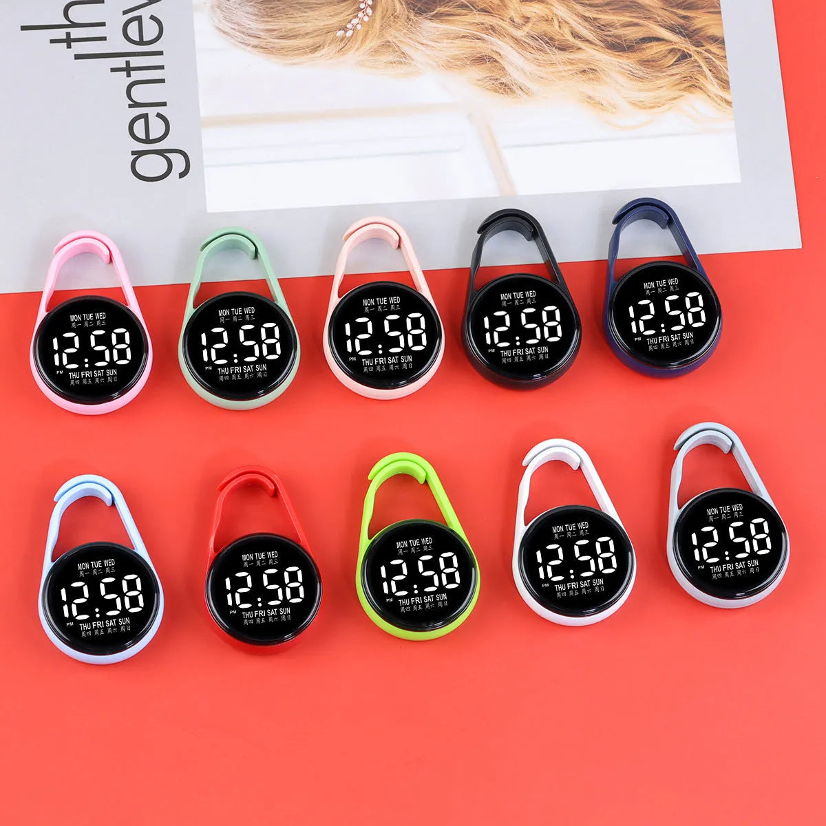 Simple luminous LED digital watch with a plastic strap, shown in one of ten available colours.
