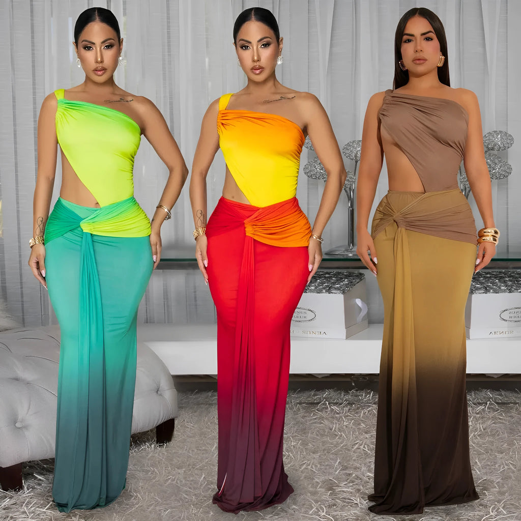Brown gradient sleeveless dress with cross-shoulder straps and a long skirt on a model.