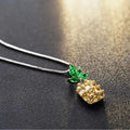 Silver geometric pineapple fruit pendant on a women's fashion necklace.