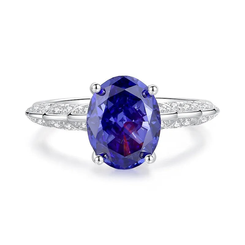 Heart-shaped high carbon zircon stone set in a sterling silver women's ring, shown in a Tan Sang colour.