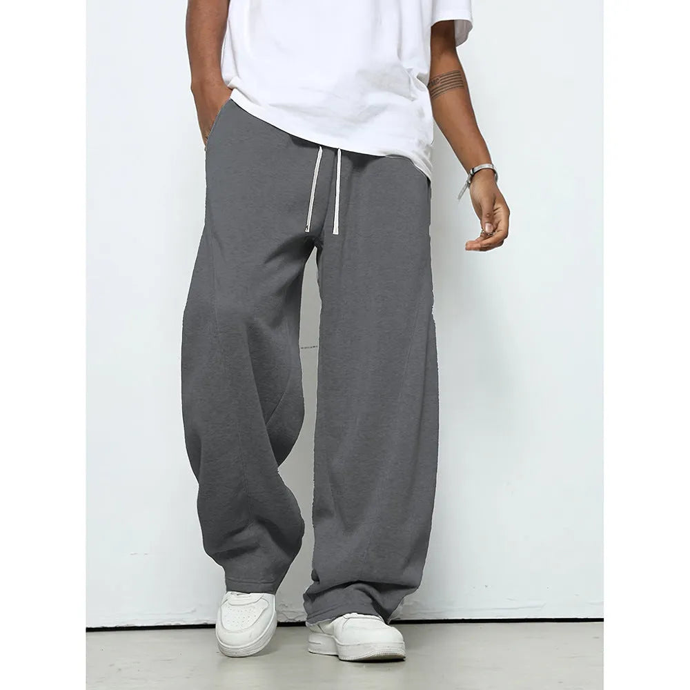 Men's casual polyester trousers with elastic waistband in straight leg design