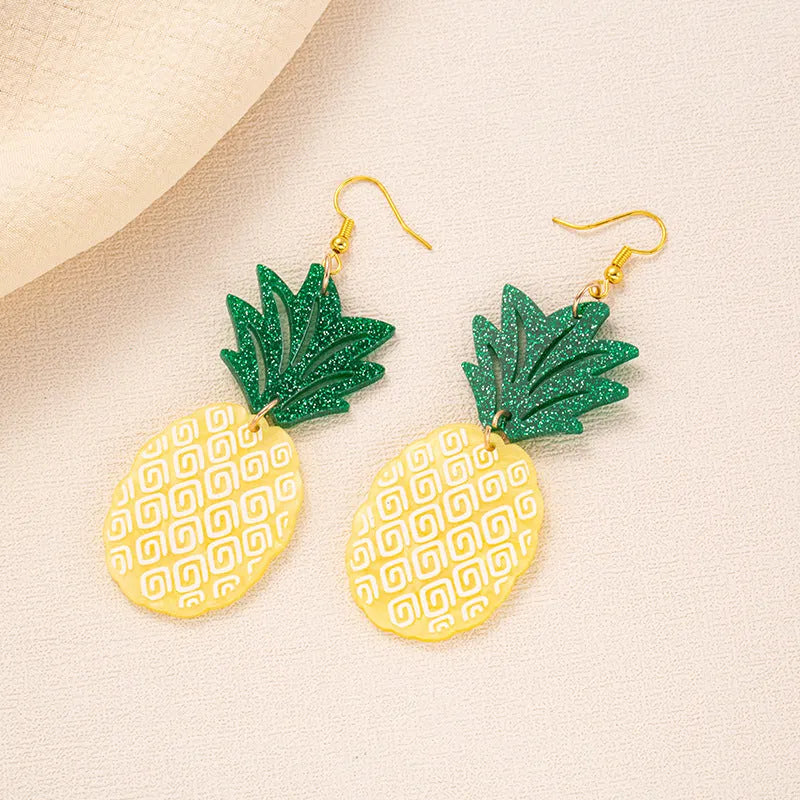 A pair of drop-shaped acrylic earrings designed like coconut leaves, in one of five colour variations.