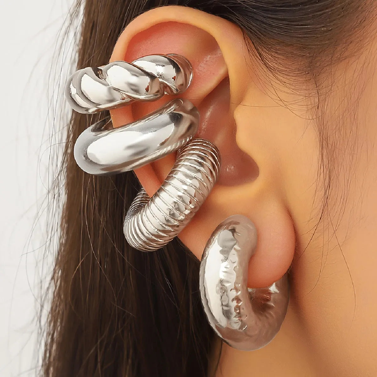 Geometric ear clips set in gold and silver colours for women without pierced ears