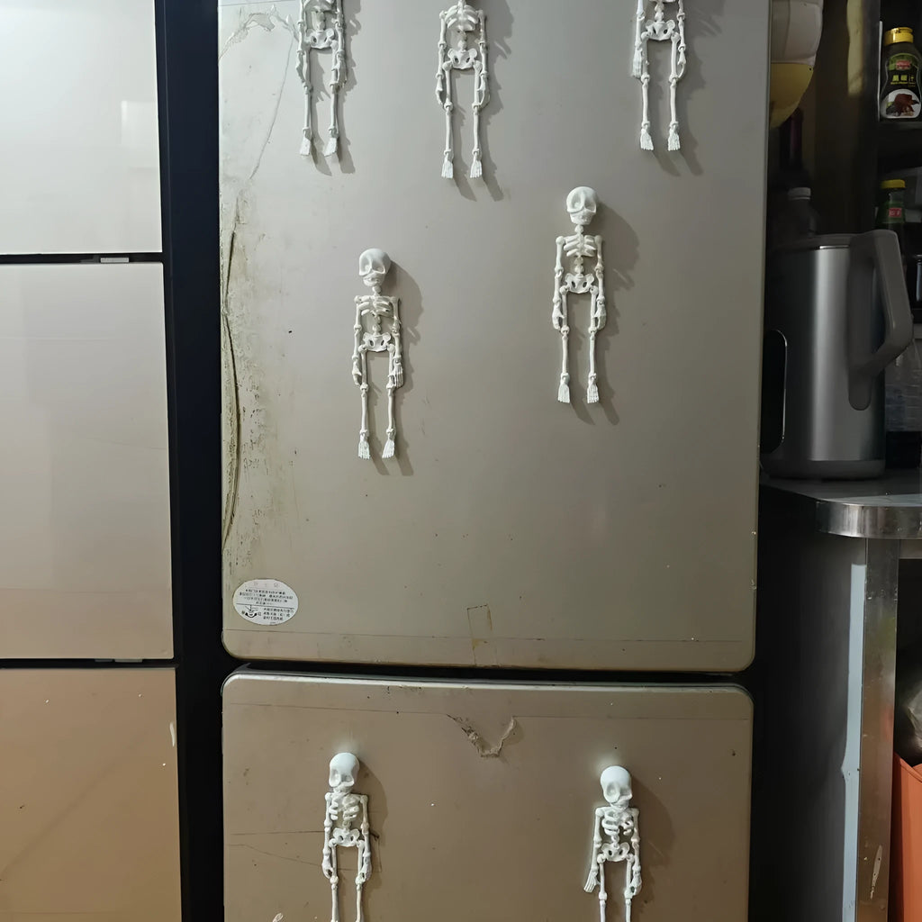 A detailed 3D printed white skull refrigerator magnet, 18cm tall, against a dark background.