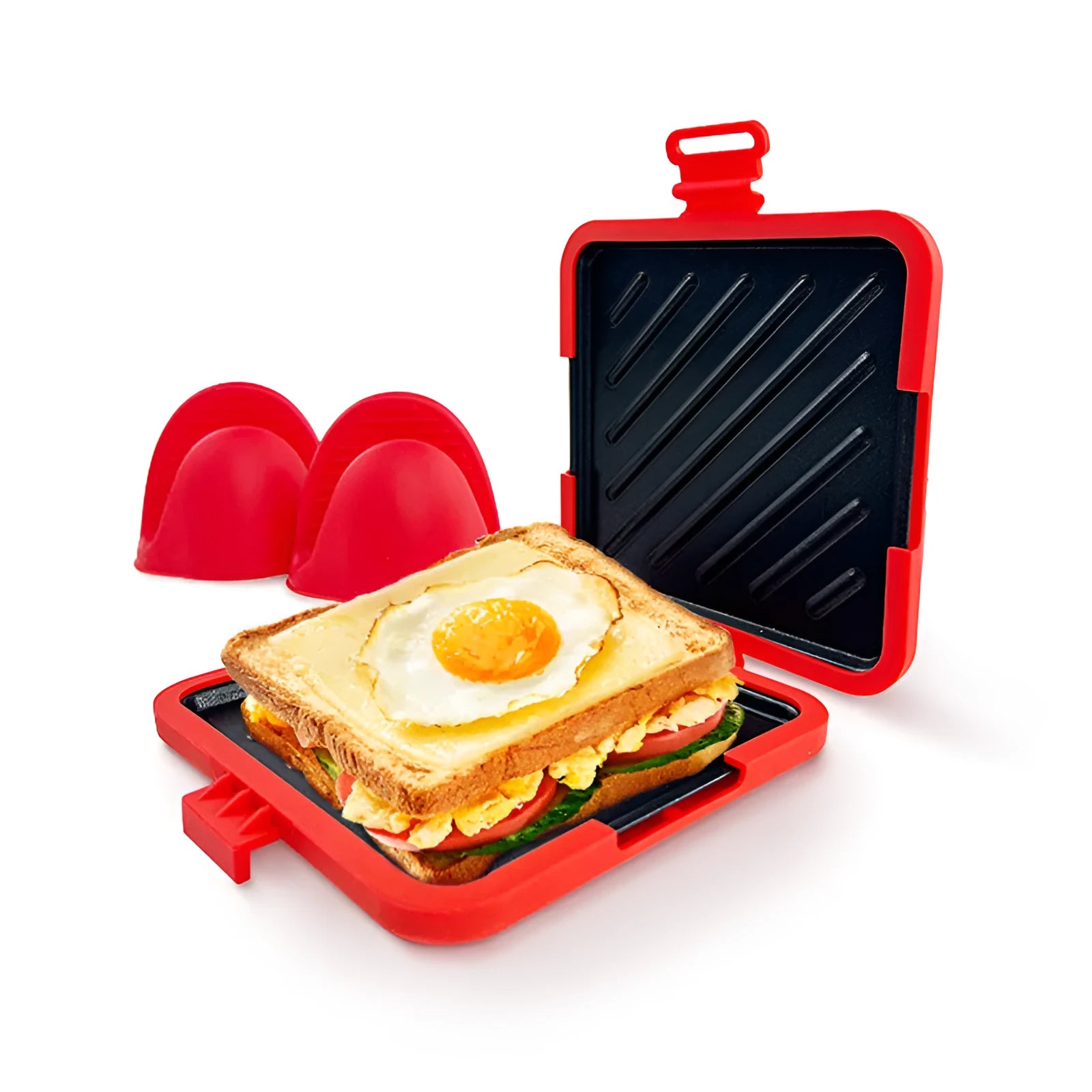 Red silicone baking tray with integrated handles and matching oven gloves