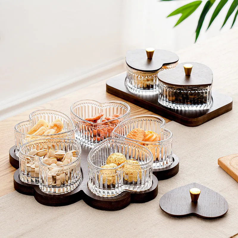 Glass snack plate with heart-shaped lids on a multi-grid tray in a retro style.