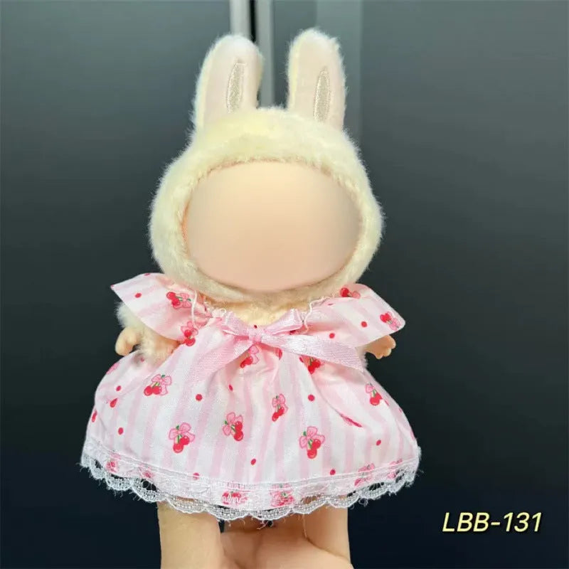 Plastic doll costume for a 17cm tall vinyl figurine on a white background.