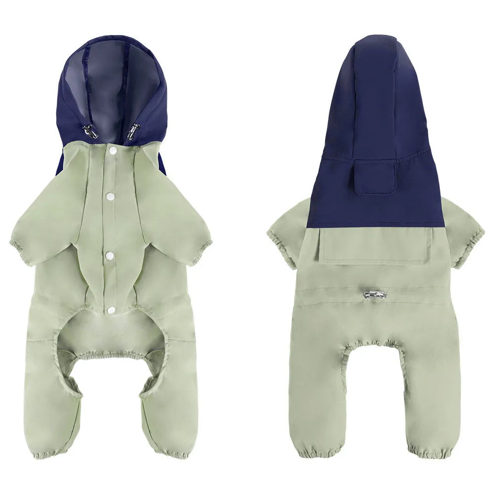 Small to medium sized dog wearing a khaki coloured waterproof polyester shell jacket.