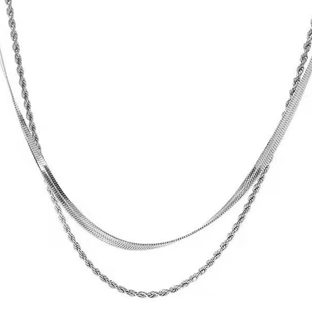 Women's retro geometric double-layer twist necklace on an adjustable snake bones chain.
