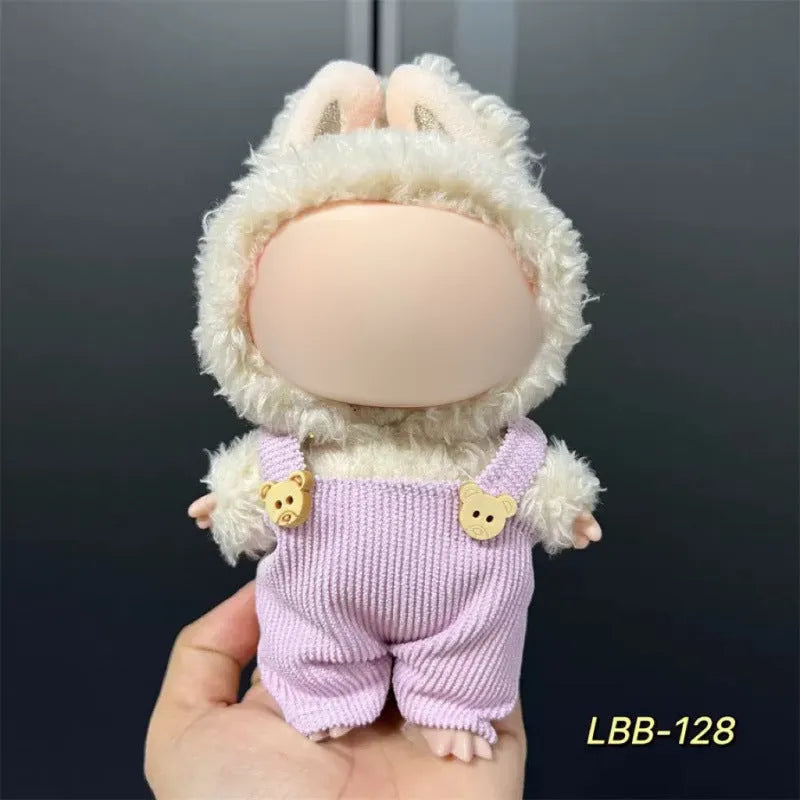 Plastic doll costume for a 17cm tall vinyl figurine on a white background.