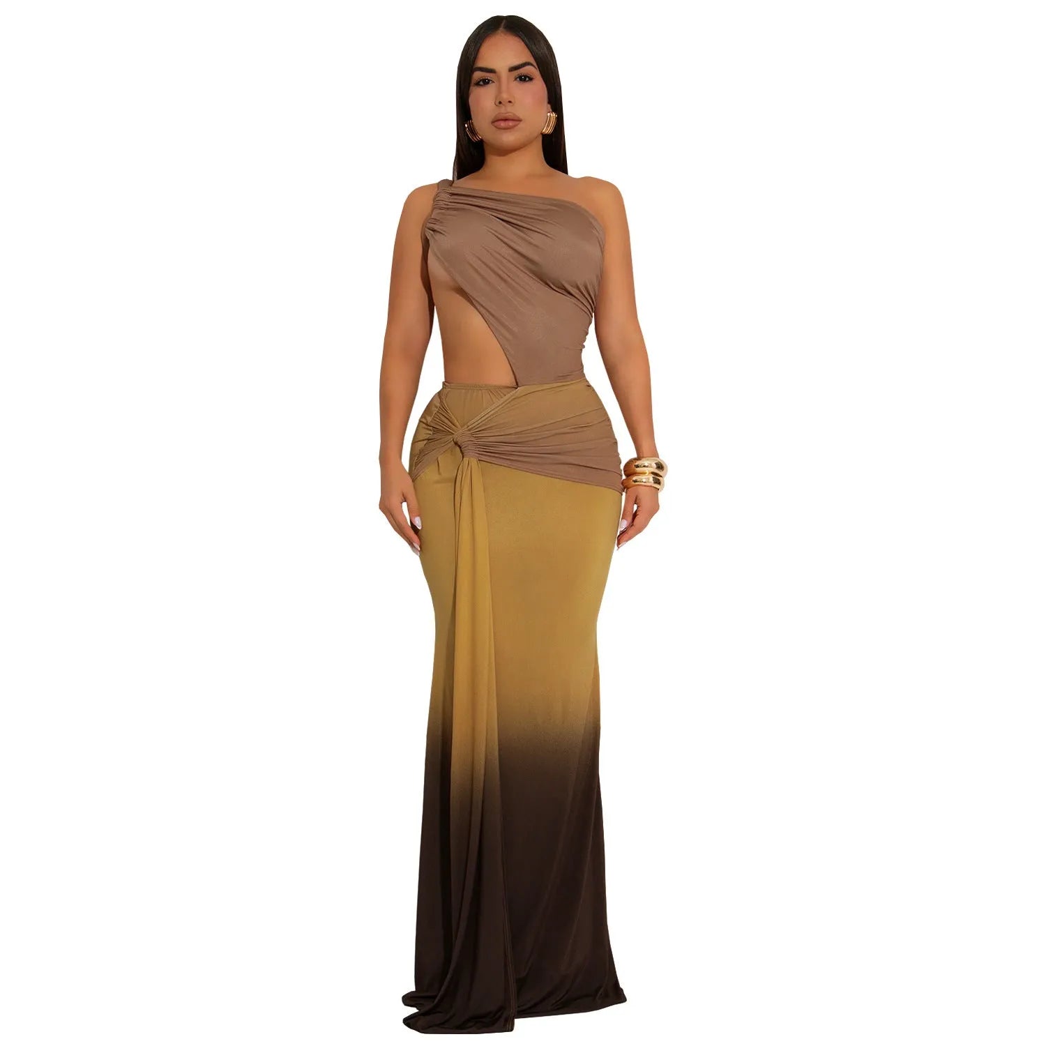 Brown gradient sleeveless dress with cross-shoulder straps and a long skirt on a model.