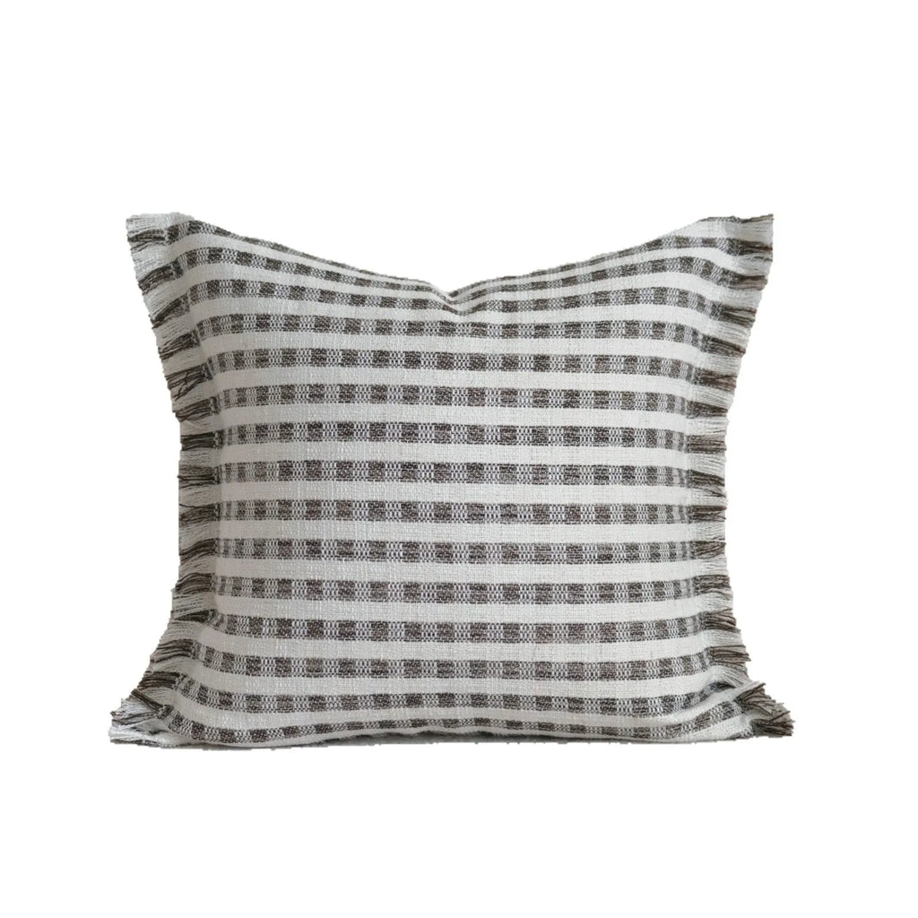Coffee brown Chinese classical style cushion with striped and patchwork designs on a sofa.