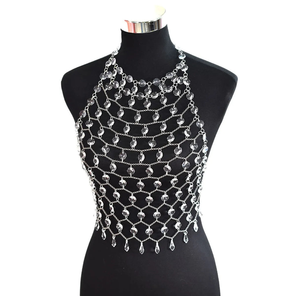 Hand-woven transparent acrylic sequinned plastic resin body chain draped flat.