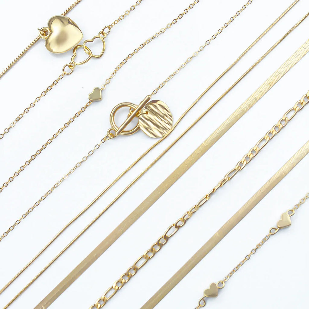 10-piece gold electroplated women's necklace set with snake bone chains and alloy pendants