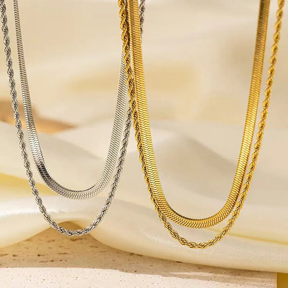 Women's retro geometric double-layer twist necklace on an adjustable snake bones chain.