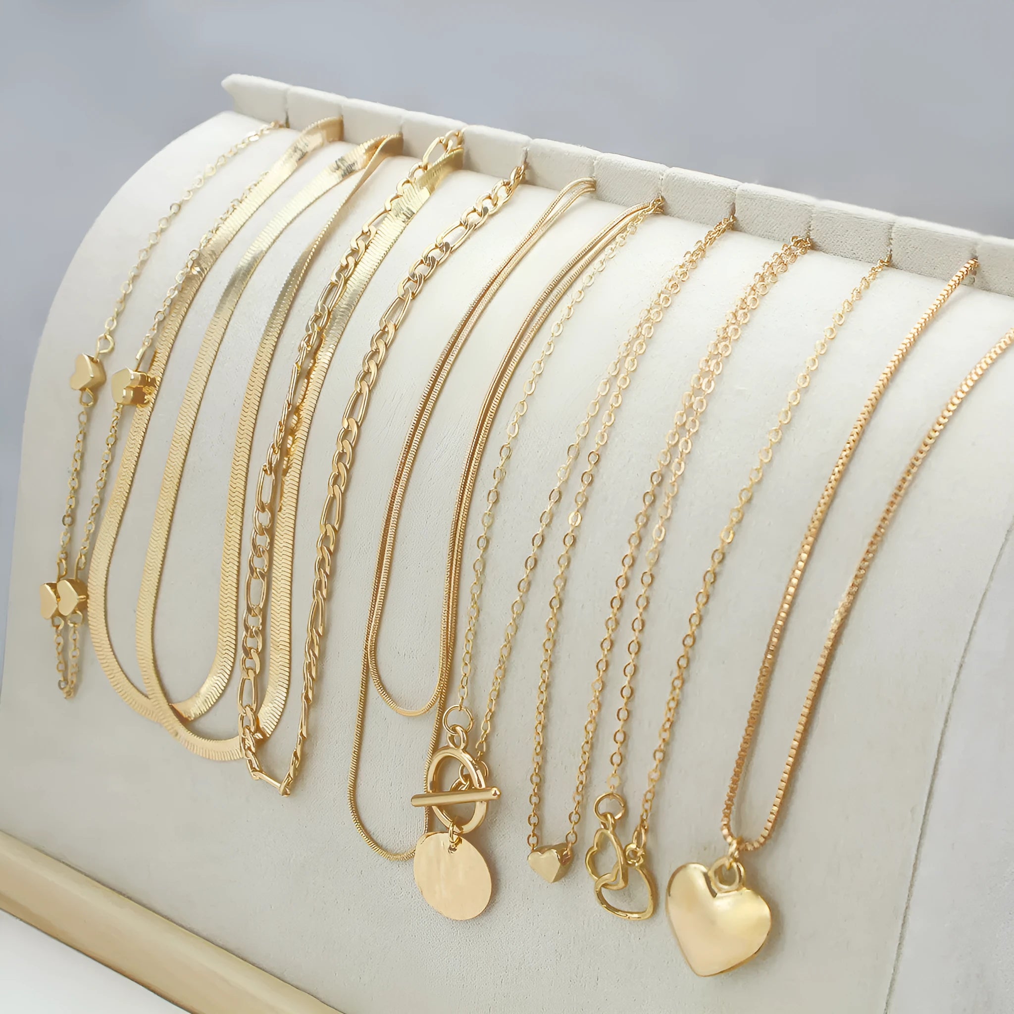 10-piece gold electroplated women's necklace set with snake bone chains and alloy pendants