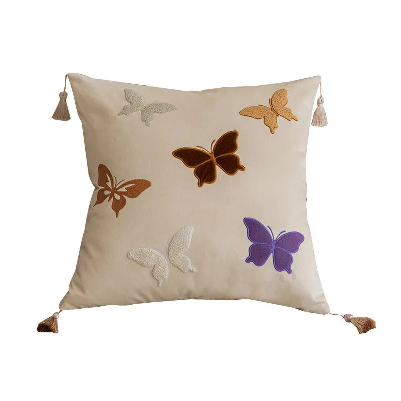 Square beige cushion with detailed Chinese butterfly embroidery design.