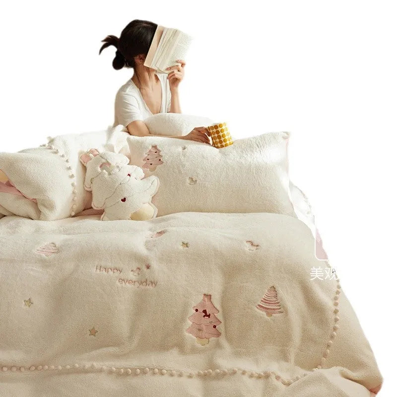Winter-themed milk fibre bedding set with Christmas tree print on quilt cover and pillowcases.