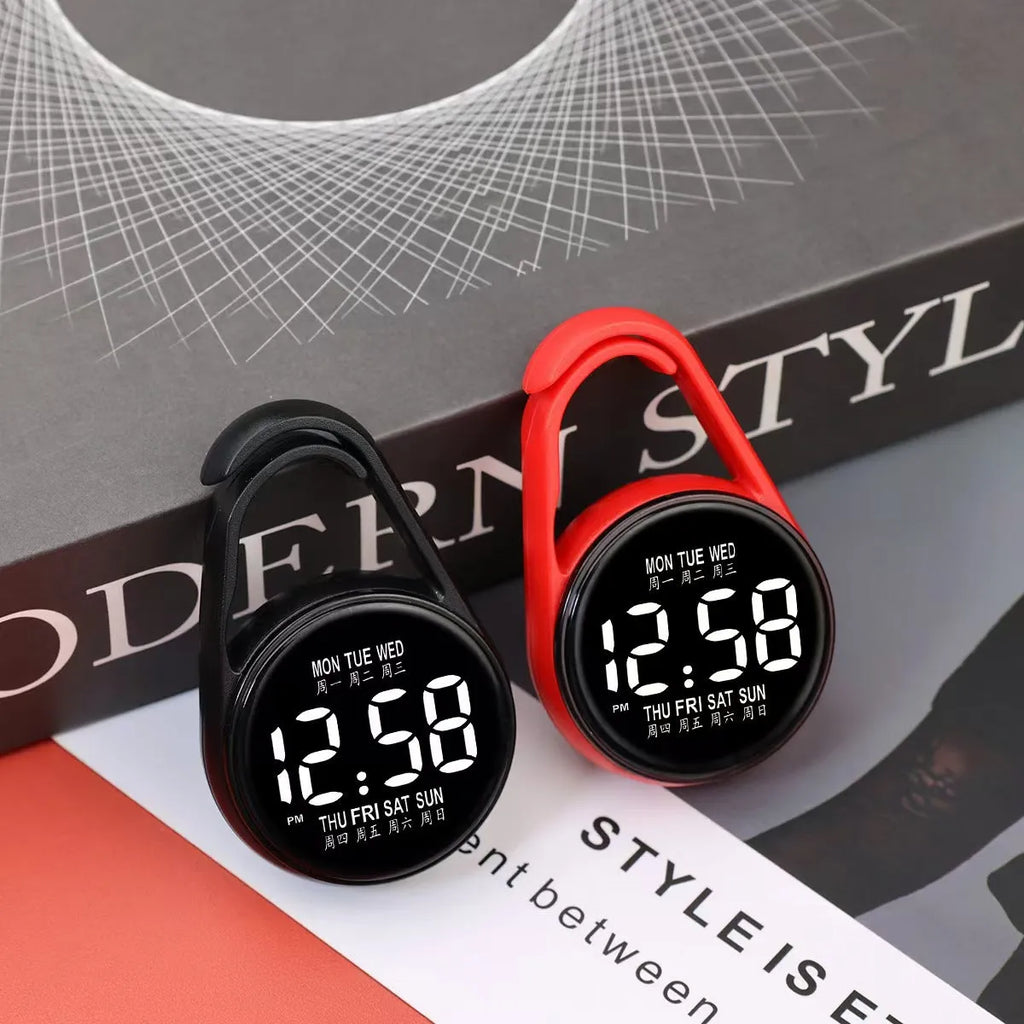 Simple luminous LED digital watch with a plastic strap, shown in one of ten available colours.