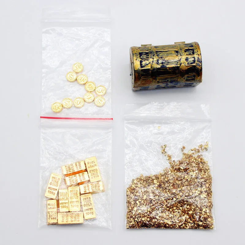 Alloy gold coin treasure box and gold bar doll house accessory set.