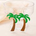 A pair of drop-shaped acrylic earrings designed like coconut leaves, in one of five colour variations.