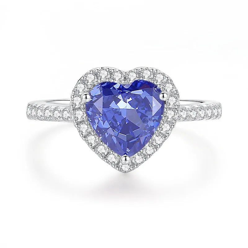 Heart-shaped high carbon zircon stone set in a sterling silver women's ring, shown in a Tan Sang colour.