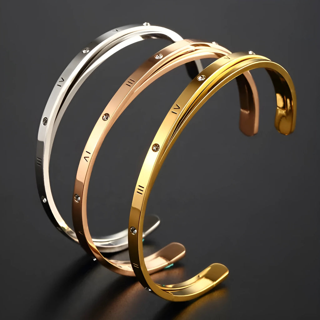 Adjustable open-ended bracelet with love heart design in gold, rose gold, or silver stainless steel finish