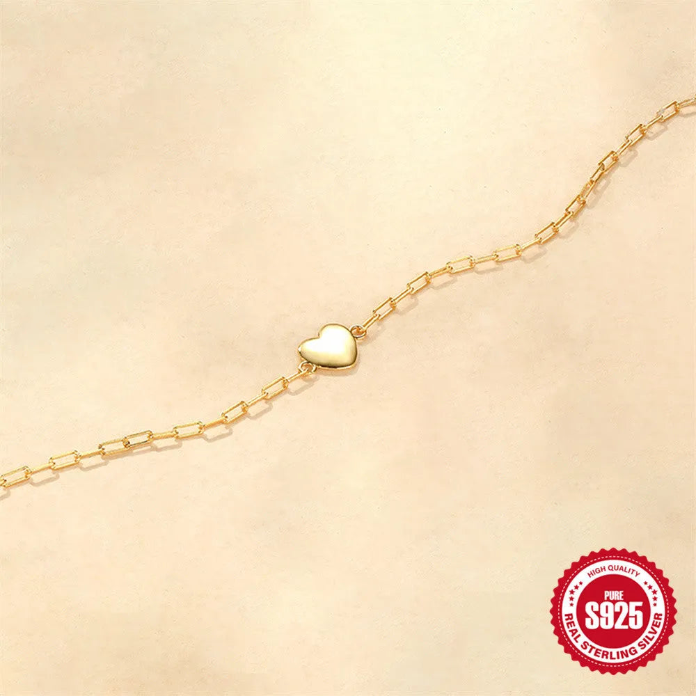 S925 sterling silver bracelet with clip chain and geometric heart charm in gold colour