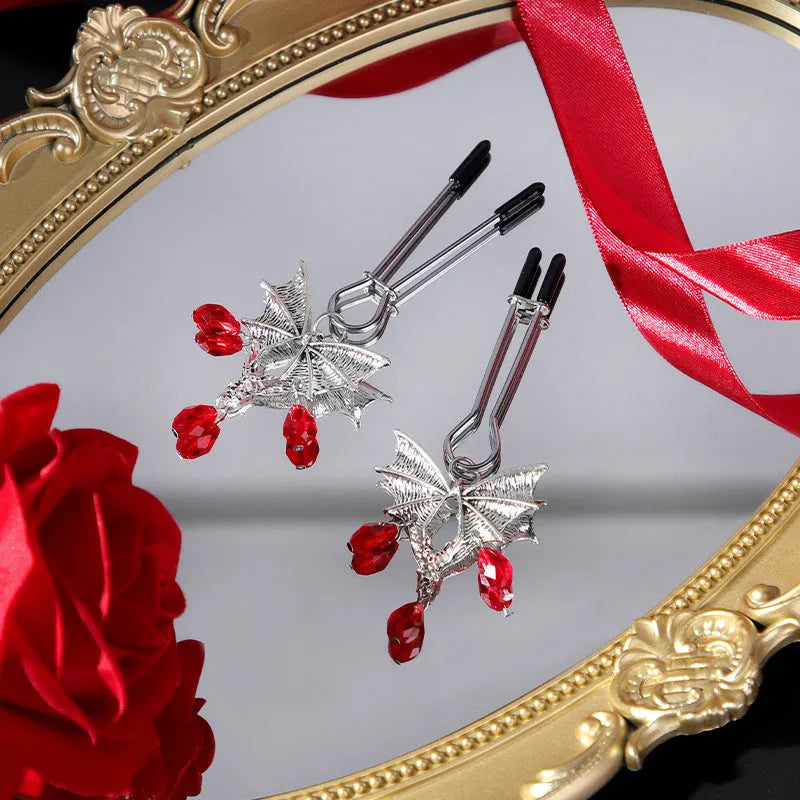 Silver alloy diamond bat nipple clamp with adjustable pressure and ruby bat decorative design