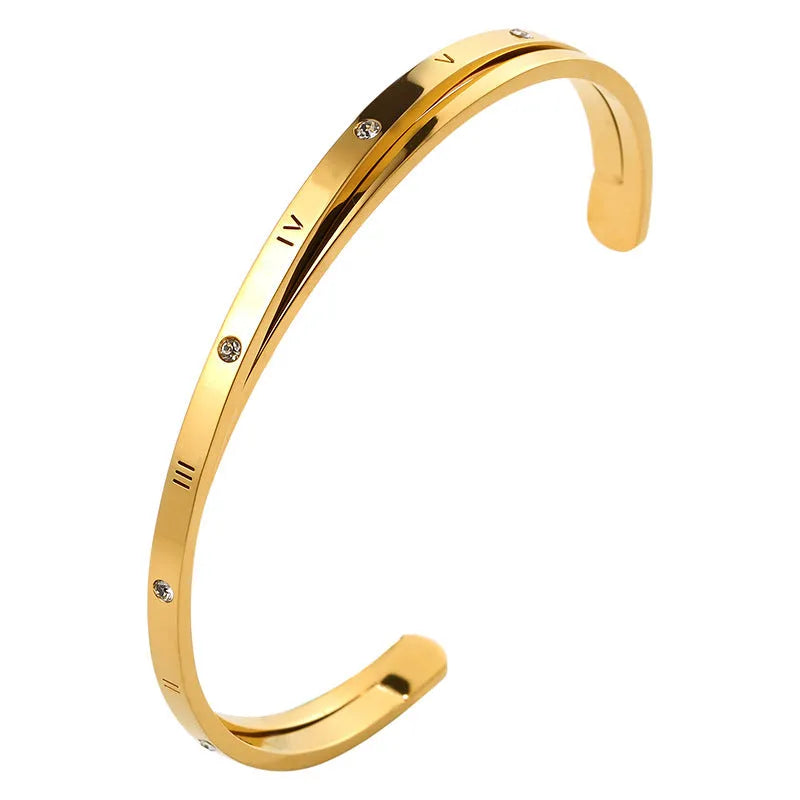 Adjustable open-ended bracelet with love heart design in gold, rose gold, or silver stainless steel finish