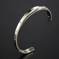 Adjustable open-ended bracelet with love heart design in gold, rose gold, or silver stainless steel finish