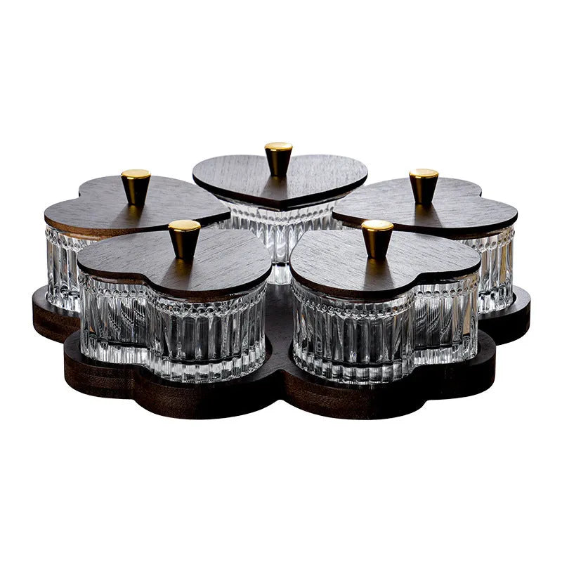 Glass snack plate with heart-shaped lids on a multi-grid tray in a retro style.