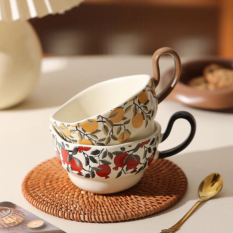 Antique style ceramic coffee cup and saucer set in retro black or orange colour.