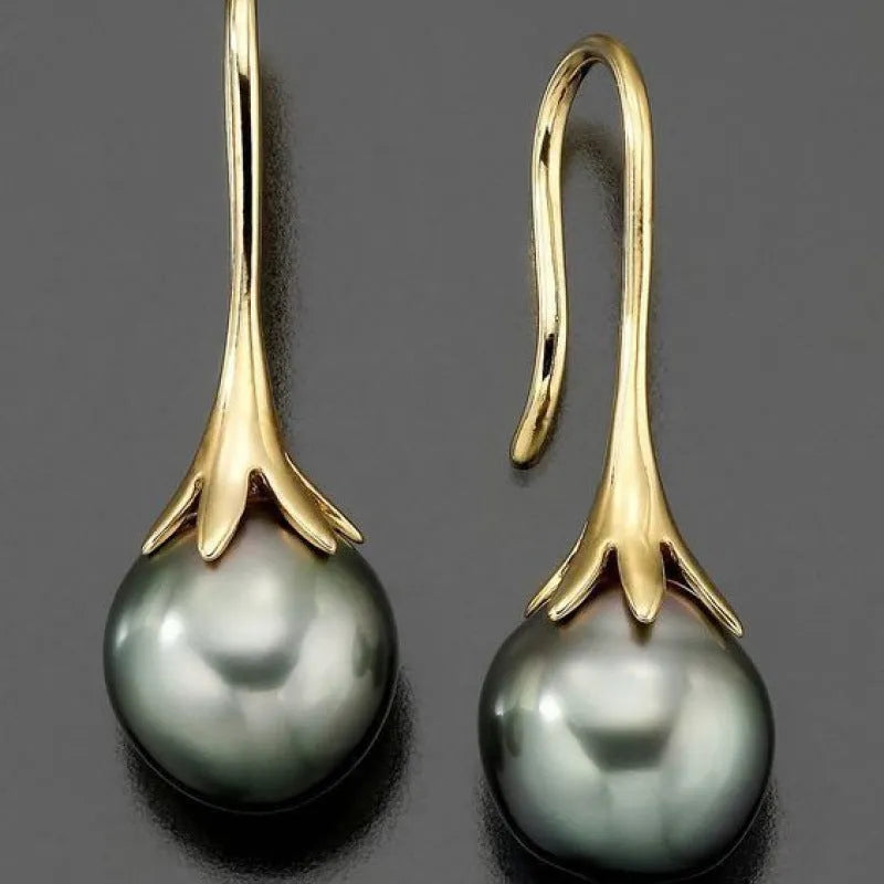 Gold retro style women's fashion earrings with creative design