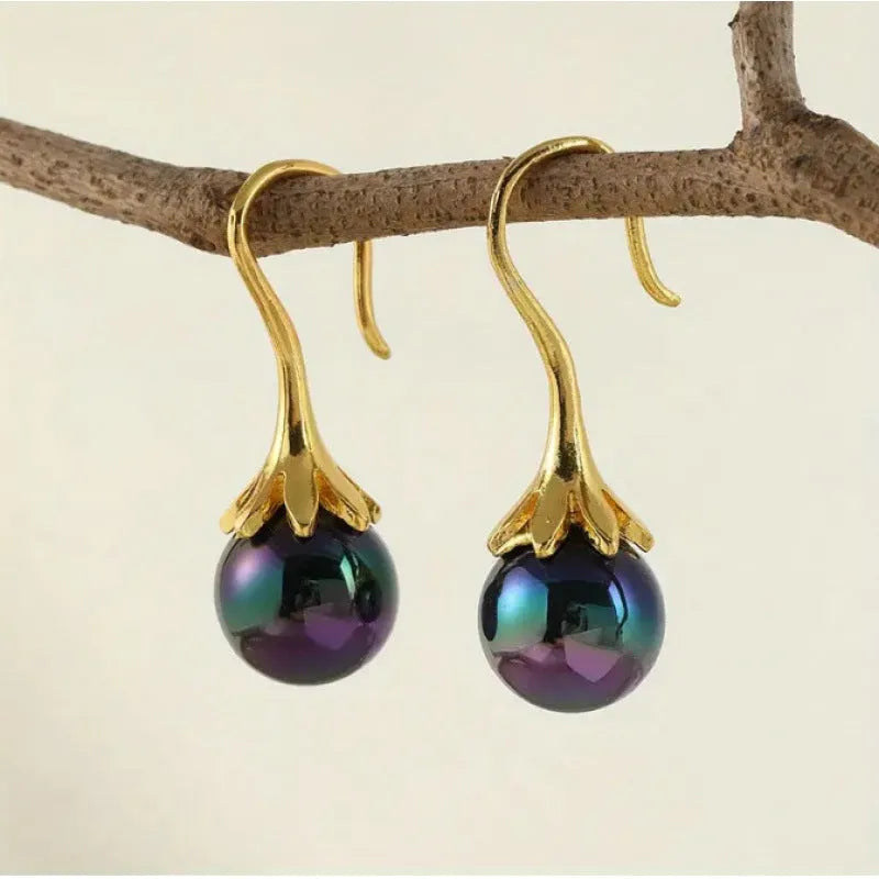 Gold retro style women's fashion earrings with creative design