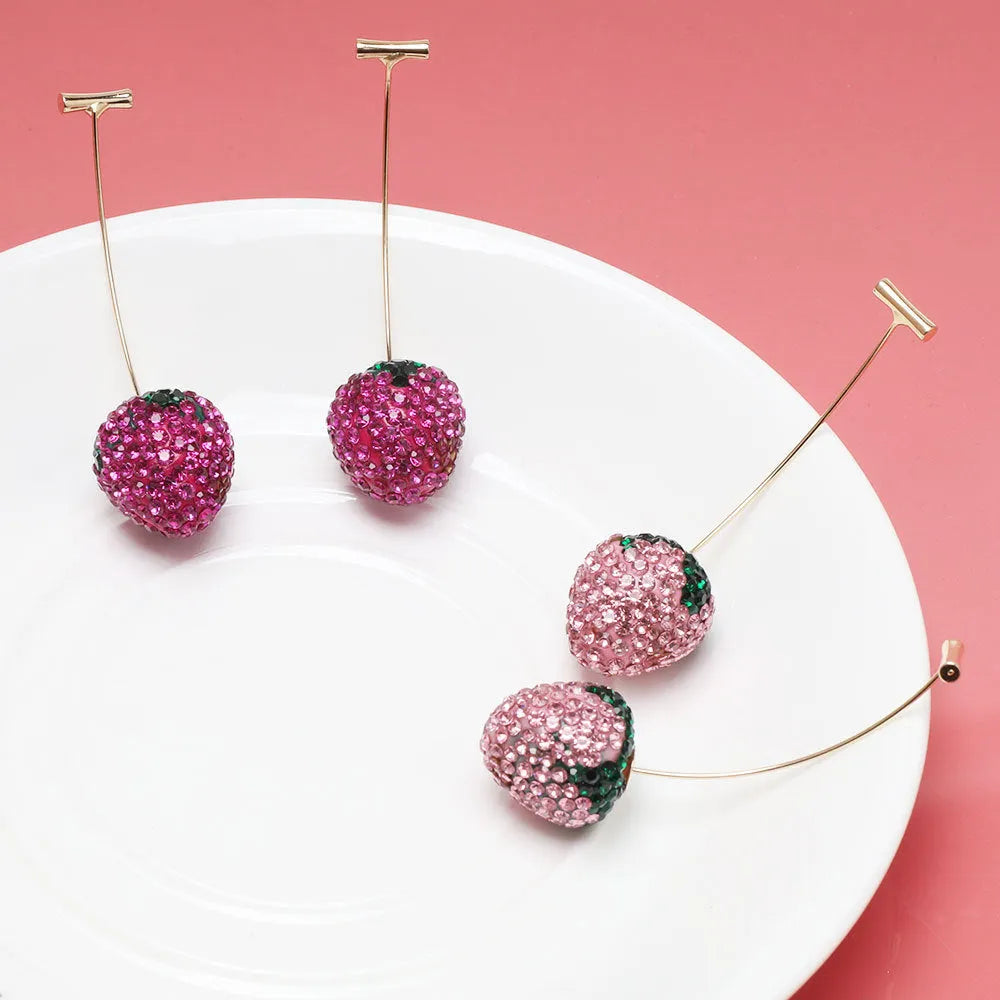 Red zinc alloy strawberry earrings with geometric shape and spot drill texture.