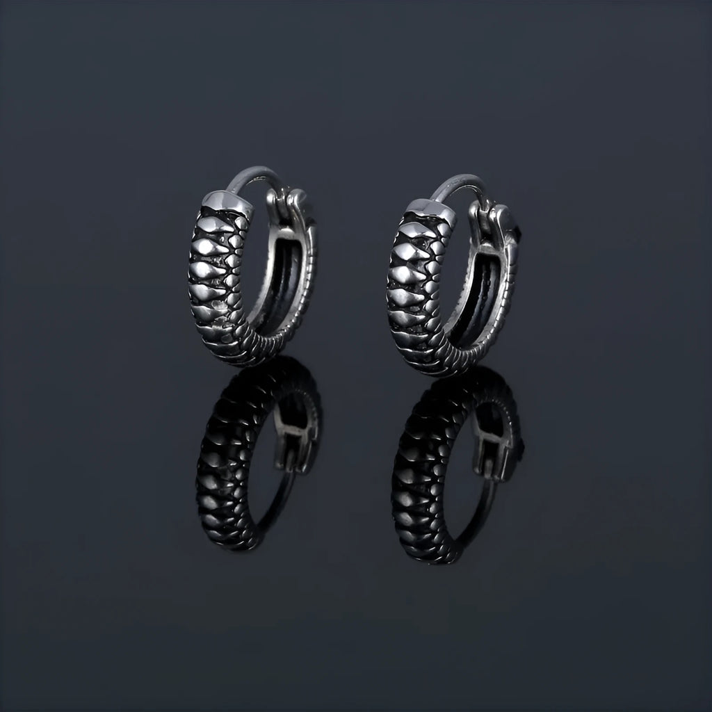 Silver geometric alloy earrings with retro twist design and striped sports-style elements
