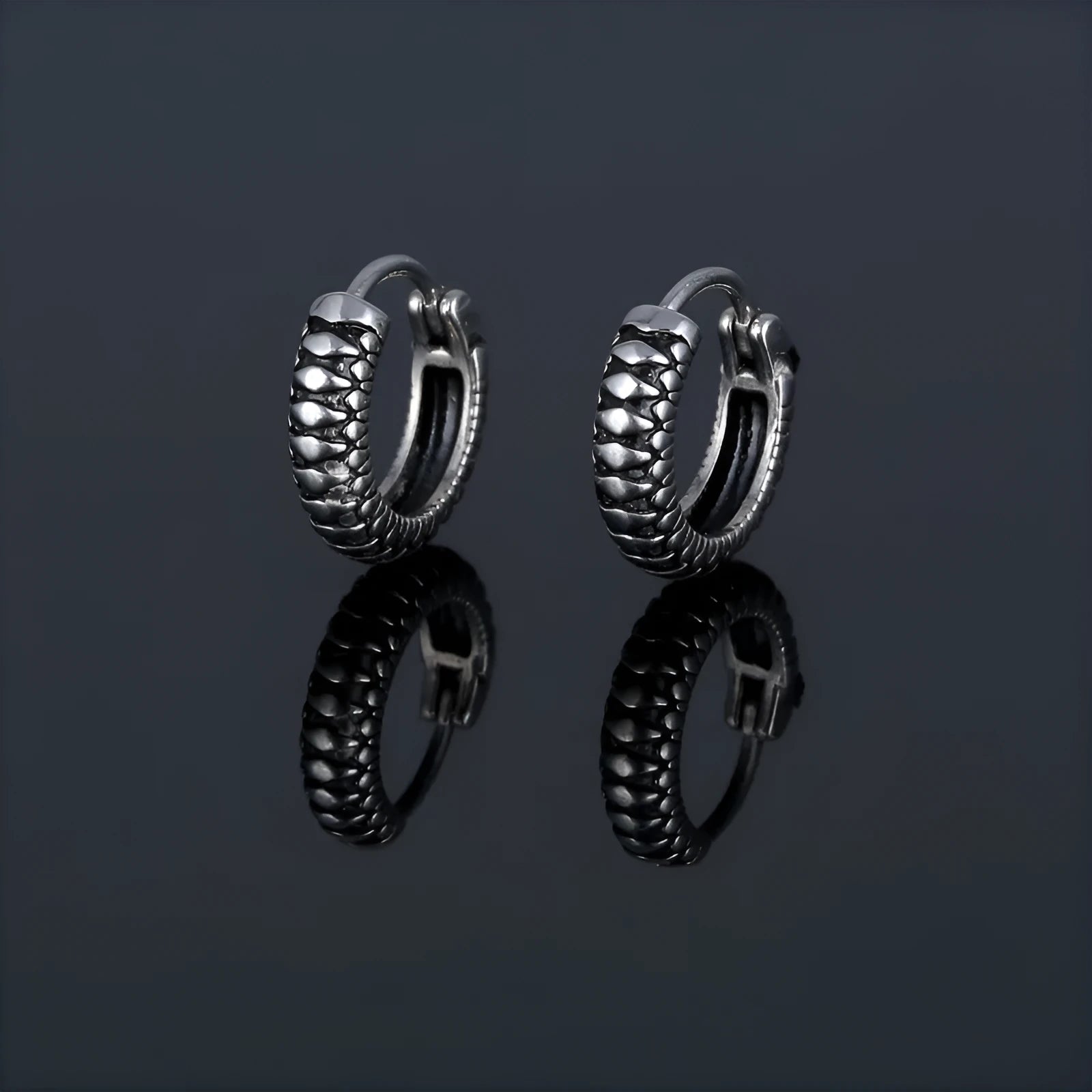 Silver geometric alloy earrings with retro twist design and striped sports-style elements