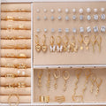 108 geometric alloy pearl earrings with electroplated gold and yellow finishes, round elements, no box