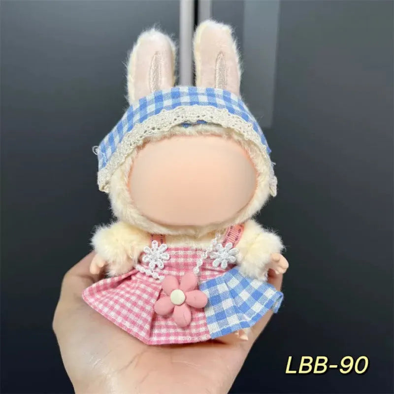 Plastic doll costume for a 17cm tall vinyl figurine on a white background.